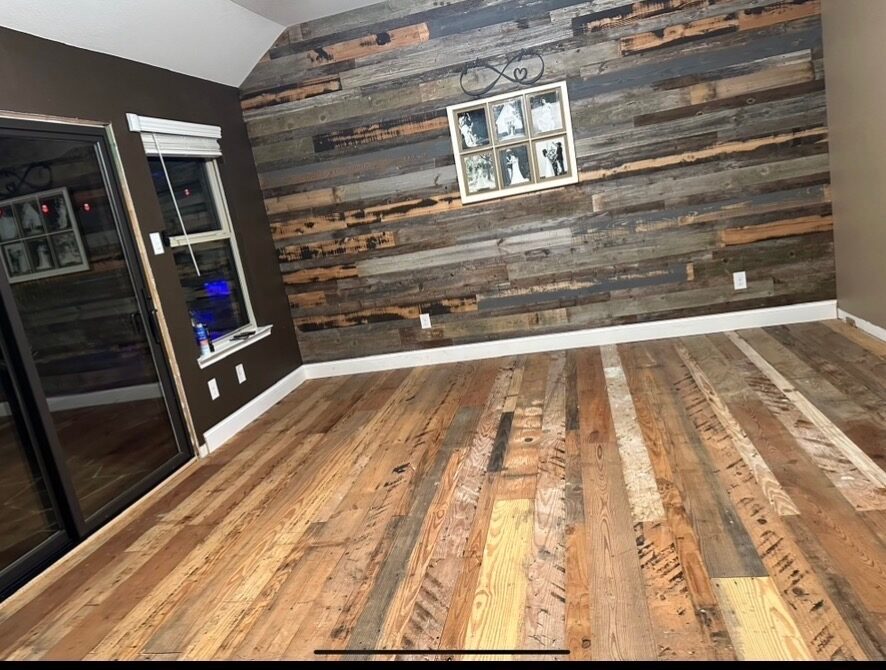 Reclaimed barnwood accent wall with wood floors