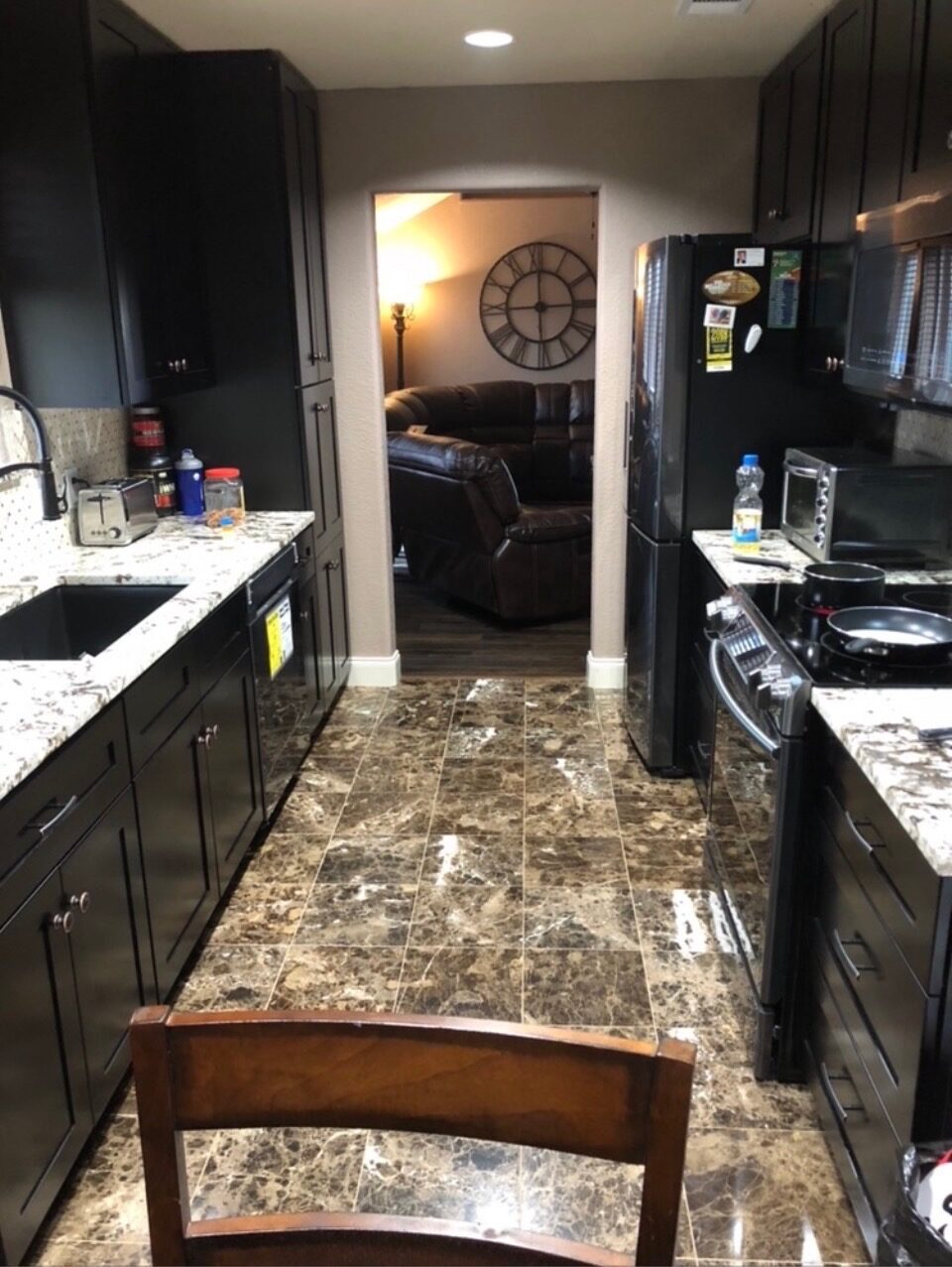 Kitchen remodel with granite and stainless finishes
