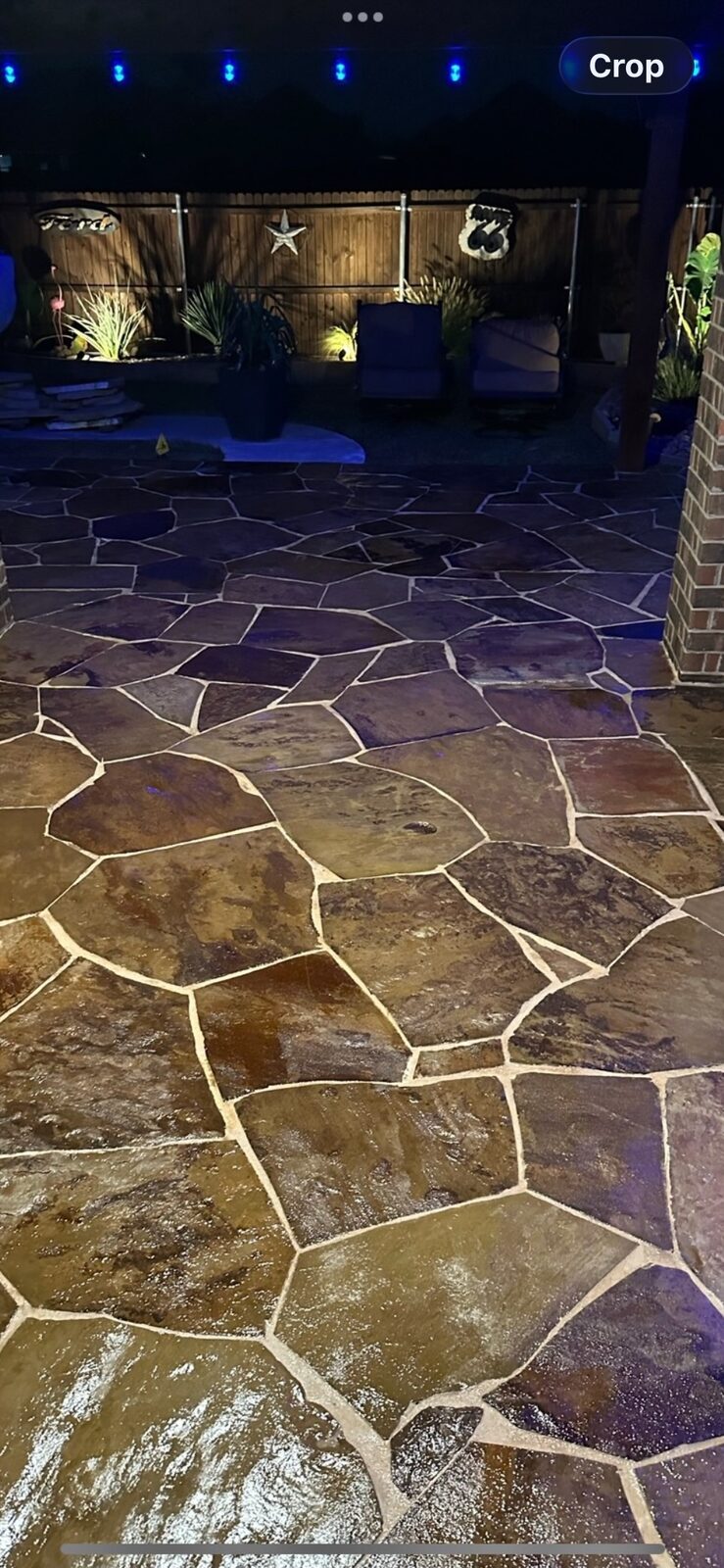 Flagstone patio with LED edge lighting at night