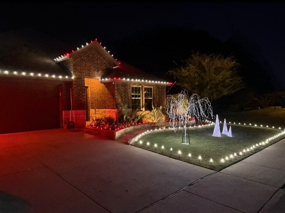 Home with professionally hung Christmas lights